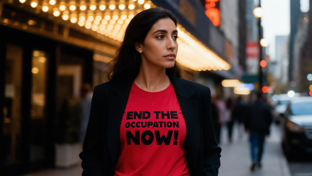 Woman in an End the Occupation Now t-shirt walking past a Broadway theatre