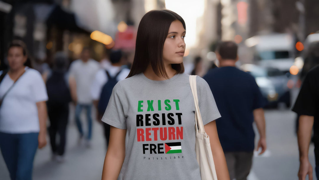 Woman in an Exist Resist Return t-shirt with a tote bag in Midtown Manhattan