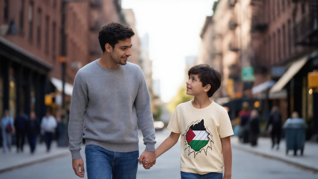 Father talking with his child in a Palestine Hero kids t-shirt in Park Slope, Brooklyn