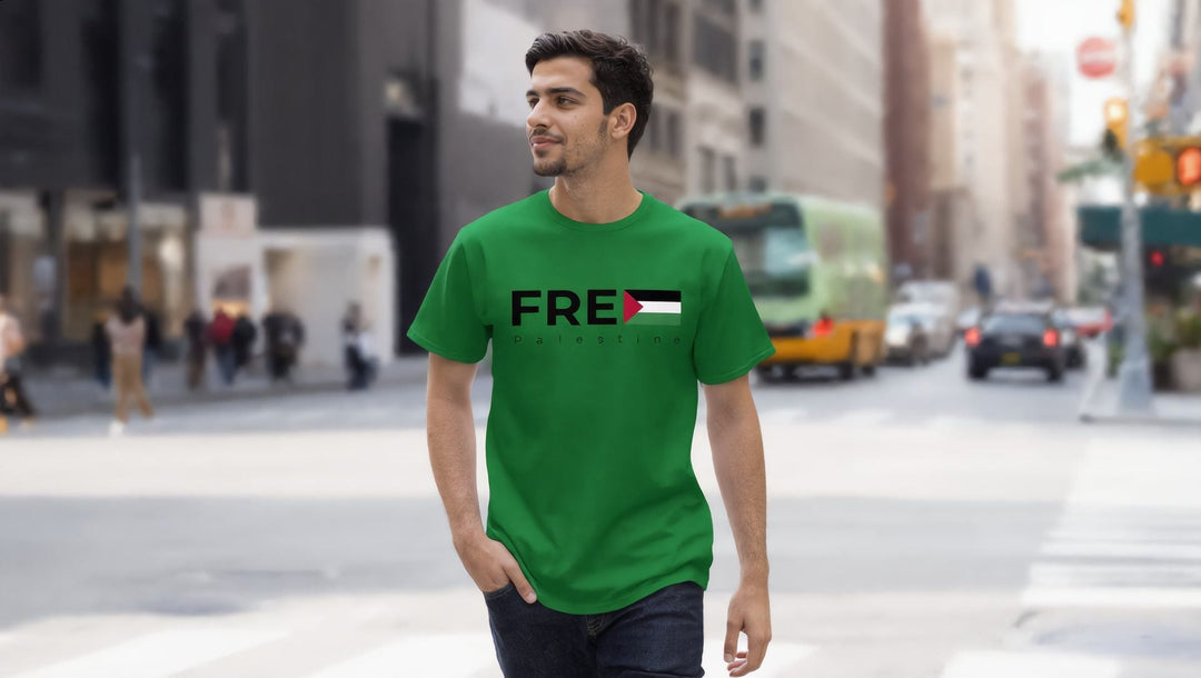 Man in a green Free Palestine t-shirt on West 34th Street near Herald Square