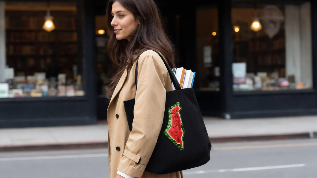 Woman carrying a Palestine watermelon tote with books in Park Slope, Brooklyn