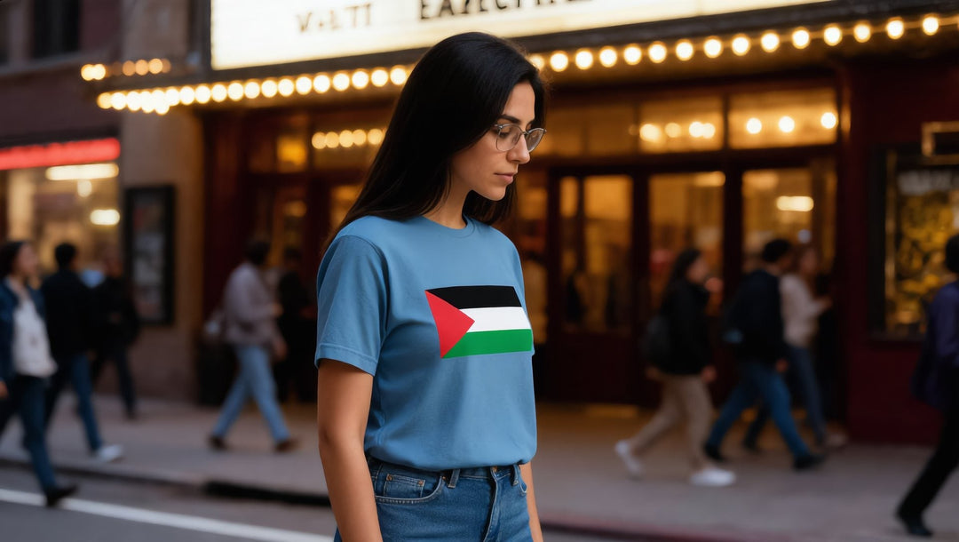 Woman in a Palestine flag t-shirt outside a movie theater in the East Village, New York