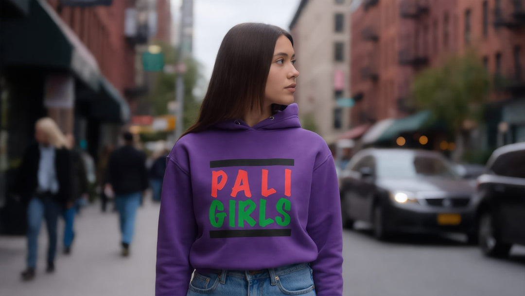 Woman in a purple Pali Girls hoodie on a street in Bay Ridge, Brooklyn