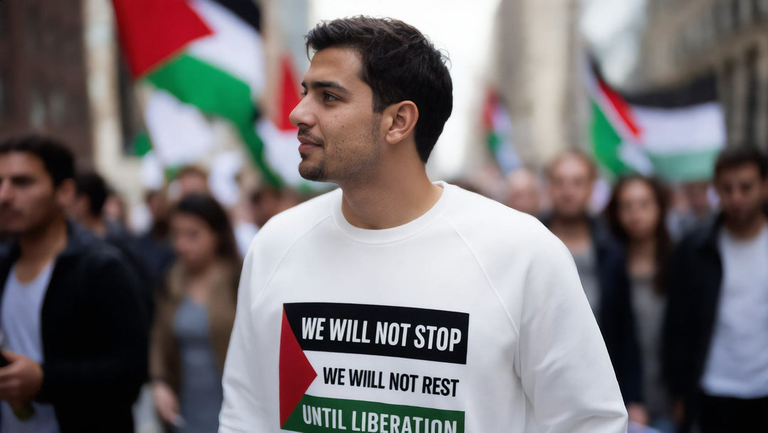 Man in a We Will Not Stop sweatshirt at a march for Palestine on Broadway, New York