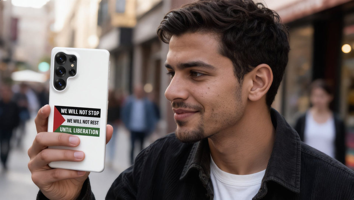 Man holding a Samsung phone in a We Will Not Stop case in Boerum Hill, Brooklyn
