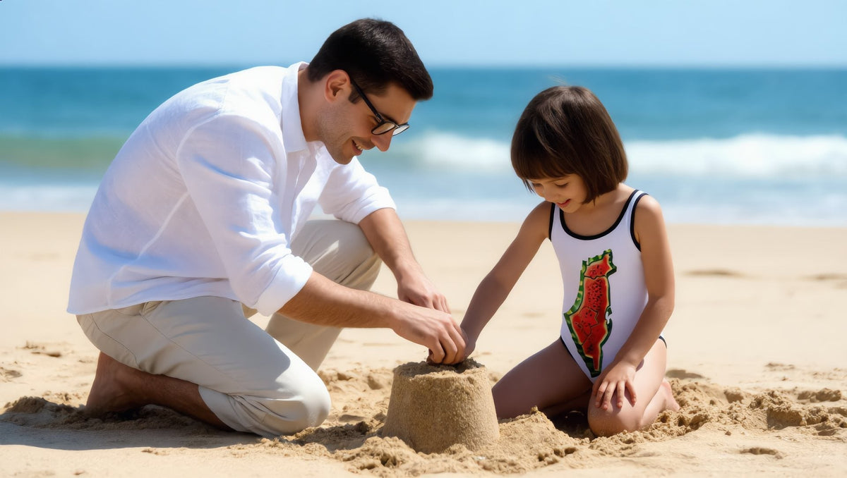 Father and child building a sandcastle on Rockaway Beach, the child in a watermelon map swimsuit