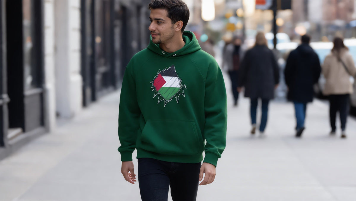 Man wearing a Palestine Hero hoodie on Graham Avenue, East Williamsburg, Brooklyn