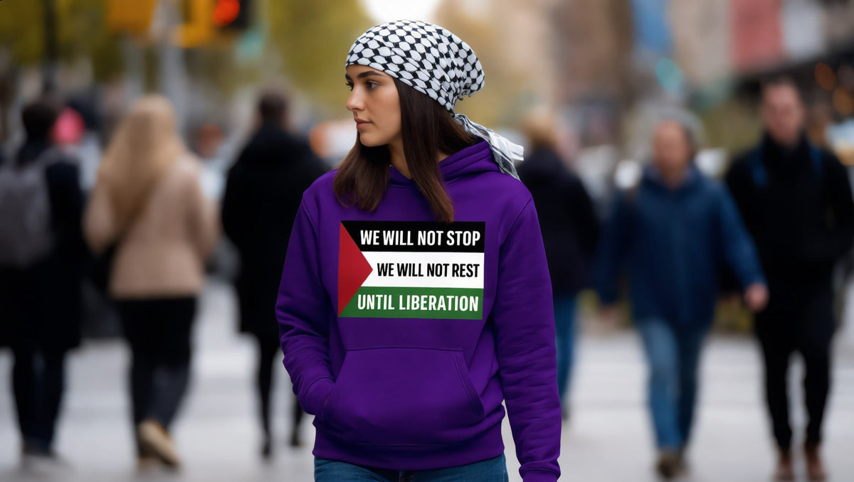 Woman wearing a We Will Not Stop hoodie on Broadway, Upper West Side, New York