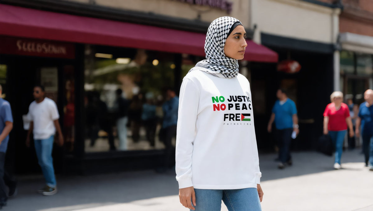 Woman wearing a No Justice No Peace long sleeve tee on Fulton Street, Brooklyn